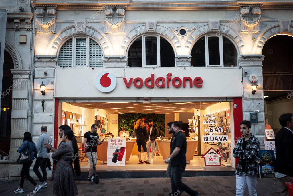 ISTANBUL, TURKEY - MAY 21, 2022: Vodafone logo on their Istanbul shop. Vodafone is a british phone carrier and internet service provider, one of main in Turkey