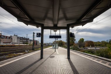 COLOGNE, GERMANY - NOVEMBER 6, 2022: Platform of Koln West bahnhof with passengers ready for a train. Koln Westbhf is Cologne's west train station, in the suburb of Neustadt. 