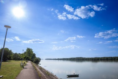 Panorama of the Danube river (rijeka dubav) in Sarengrad, in easter croatia, during a sunny summer afternoon. Sarengrad is a small villageof Slavonia, on border with serbia, part of Ilok. clipart