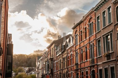 Medieval brick and stone facades in the city center of Liege, Belgium, belonging to residential urban buildings.