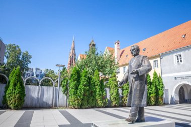 OSIJEK, CROATIA - SEPTEMBER 21, 2023: Statue of Franjo Tudjman in the city center of Osijek. Tudman, or Franjo Tudjman was the first croatian president following the independence of Croatia in 1991. clipart
