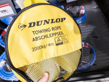 BELGRADE, SERBIA - FEBRUARY 9, 2024: Logo of Dunlop on a Towing rope for sale in Belgrade. Dunlop is an irish brand producing automotive equipment and tyres. clipart