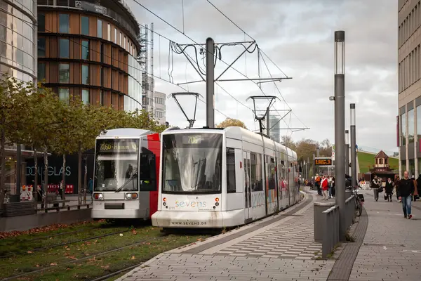 stock image DUSSELDORF, GERMANY - NOVEMBER 7, 2022: Tram of the Dusseldorf tram system called Dusseldorf Strassenbahn, passing by the center of the city. Operated by Rheinbahn, it's a public transportation system.