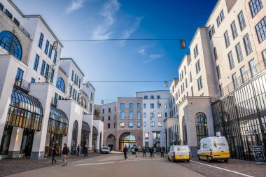 HEERLEN, NETHERLANDS - NOVEMBER 10, 2022: Panorama of Maankwartier in Heerlen netherlands. located by train station, Maankwartier is a modern residential and commercial real estate project in heeren. clipart