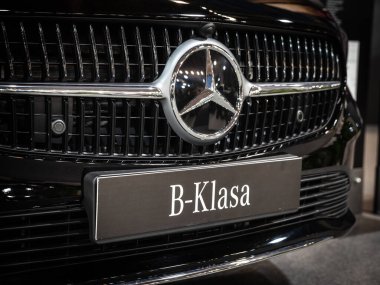 BELGRADE, SERBIA - MARCH 21, 2024: Front Custom Licence plate for a Mercedes Benz B-Class ready to be sold in Belgrade. Mercedes benz B-Class is the compact car MPV automobile of the german brand. clipart