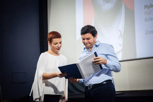 stock image BELGRADE, SERBIA - OCTOBER 26, 2023: Selective blur on Thomas Piketty preparing a lecture in belgrade, Serbia. Thomas Piketty is a French economist specialized in the studies of inequality.