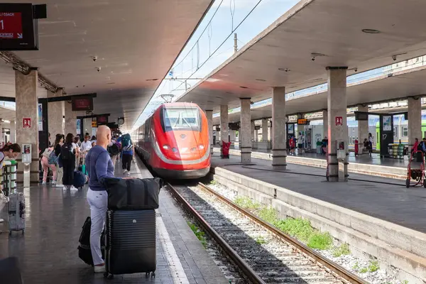 stock image FLORENCE, ITALY - JUNE 15, 2024: Frecciarossa train from Trenitalia arrives at the Firenze Santa Maria Novella station. operated by Trenitalia, this is the main high speed rail system of Italy.