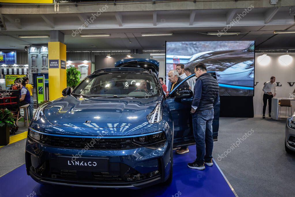 BELGRADE, SERBIA - MARCH 21, 2024: People testing a Lynk & Co SUV at a car dealership in Belgrade. Lynk & Co is a Chinese Swedish car and automotive manufacturer part of Volvo and Geely group.