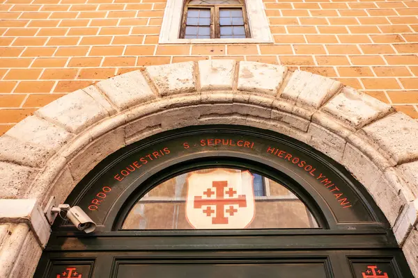 stock image ROME, ITALY - JUNE 15, 2024: The main facade of Ordo Equestris Sancti Sepulcri Hierosolymitani in Rome, showcasing the historic architecture of the Equestrian Order of the Holy Sepulchre of Jerusalem.