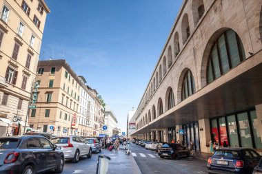 ROME, ITALY - JUNE 15, 2024: Via Marsala street by Roma Termini train station in Rome, bustling with cars and taxis. It's a major transportation and traffic axis of Rome City center. clipart