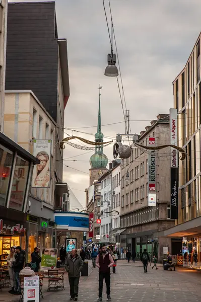 stock image DORTMUND, GERMANY - NOVEMBER 6, 2022: Panorama of the Westenhellweg, crowded with shops and stores opened and people shopping. Westenhellweg is a shopping street, high street of Dortmund altstadt, Old Town.