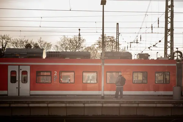 stock image TROISDORF, GERMANY - NOVEMBER 12, 2022: Deutsch Bahn suburban EMU train of the Koln S-Bahn passing by the train station of Troisdorf, a transportation hub of the NRW region of Germany.