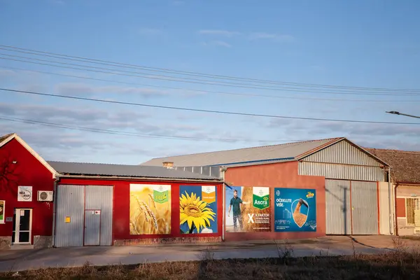 stock image NOVO SELO, SERBIA - FEBRUARY 12, 2022: Bayer's logo displayed on a retailer building in Banatsko Novo Selo, Serbia, promoting its fertilizers and pesticides for agriculture.