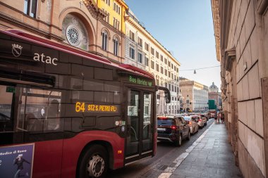 ROME, ITALY - JUNE 15, 2024: hybrid bus operating within the Rome bus system in Italy. Operated by atac, it's part of the rome transit system. clipart