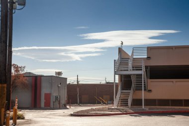 An empty industrial courtyard in Las Vegas, USA, showcasing urban architecture and industrial design elements. The scene captures the stark atmosphere of an American industrial area, emphasizing structural features and urban development. clipart