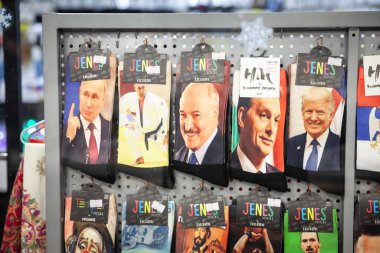 BELGRADE, SERBIA - DECEMBER 12, 2024: Novelty socks bearing the portraits of Vladimir Putin, Aleksandr Lukashenko, Viktor Orban, and Donald Trump in Serbia, a country under influence of russia; clipart