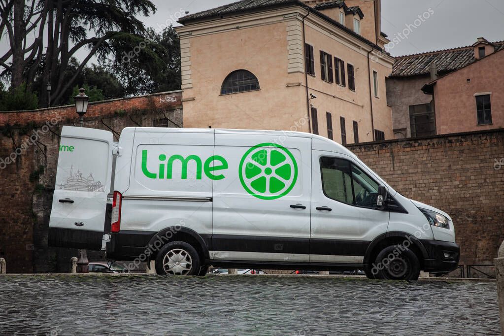 ROME, ITALY - JANUARY 15, 2025: Van with Lime Micromobility logo in Rome, used by juicers to collect, recharge electric scooters. Lime is a specialized in dockless electric scooters sharing & renting.