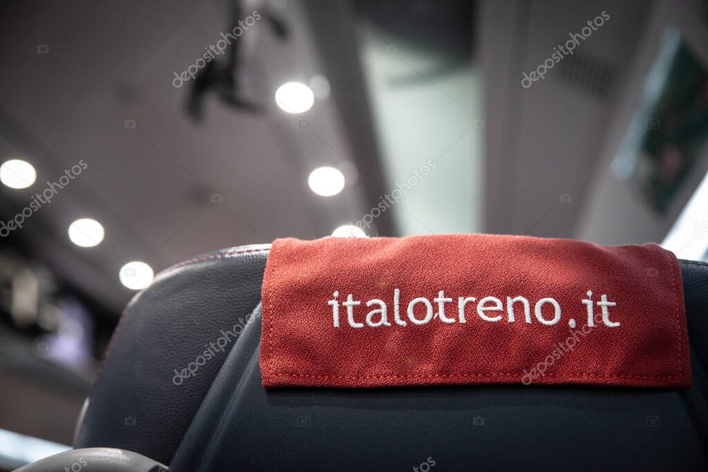 ROME, ITALY - JANUARY 15, 2025: Interior showing Italo seat cover on a high-speed Italotreno train. Italo, or NTV Nuovo Trasporto Viaggiatori is a private train carrier in italy, high speed rail..