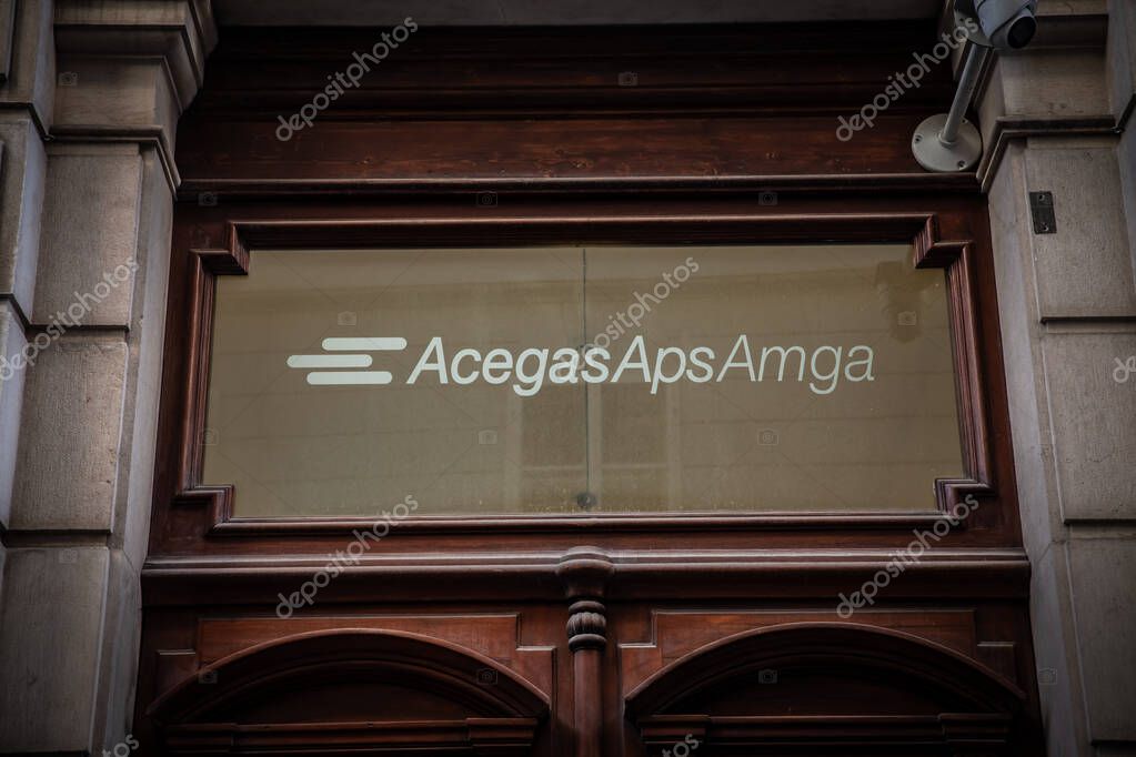 TRIESTE, ITALY - DECEMBER 17, 2024: Logo of AcegasApsAmga displayed at their office in Trieste, Italy. Acegas Aps Amga is a local utility provider involved in energy, water, waste management services.