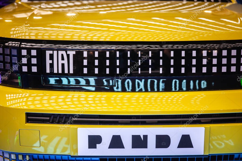 BELGRADE, SERBIA - MARCH 15, 2025: The yellow Fiat Grande Panda concept sports a pixel grille with a Fiat logo. Fiat Grande Panda is an electric car, produced by the stellantis group.