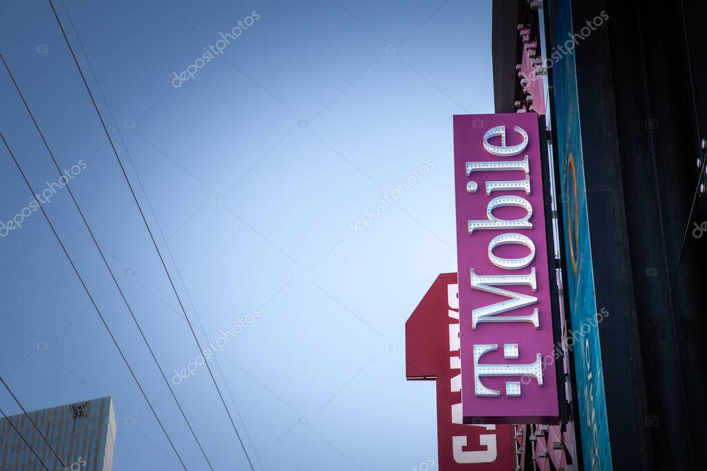 LAS VEGAS, AUGUST 21, 2024T-Mobile storefront sign against clear sky on Las Vegas Boulevard, T-Mobile USA is one of the main mobile network operator in America belonging to Deutsche Telekom.
