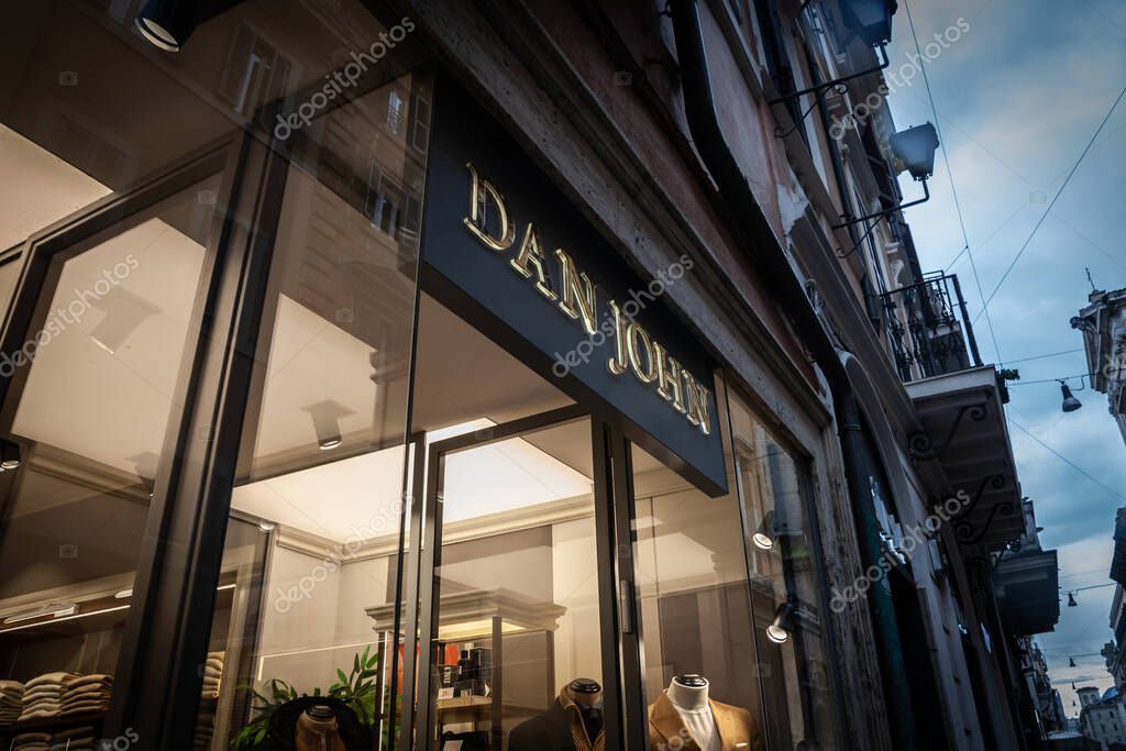 ROME, ITALY - JANUARY 15, 2025:A Dan John boutique displays refined mens clothing under a sleek storefront logo. Dan John is an italian fashion designer specialized in men's fashion
