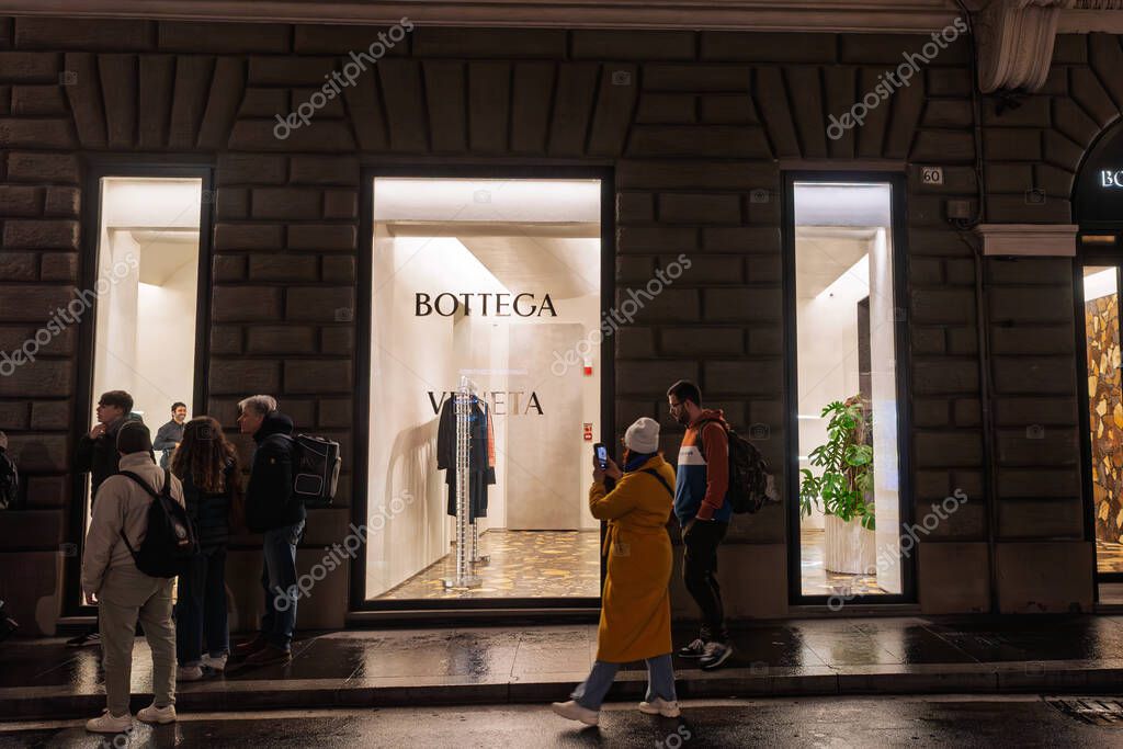 ROME, ITALY - JANUARY 15, 2025: Night view of Bottega Veneta luxury boutique in Rome at night. Bottega Veneta is an italian luxury fashion designer specialized in womenswear.