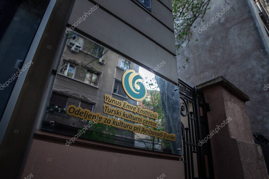 BELGRADE, SERBIA - APRIL 22, 2025: Yunus Emre Enstitusu logo and bilingual text, on their Belgrade office, highlighting Turkish cultural diplomacy in Serbia.
