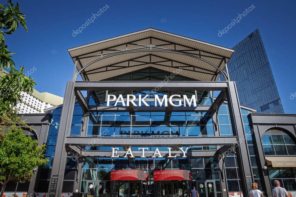 LAS VEGAS, AUGUST 21, 2024: Park MGM Las Vegas entrance with a sunlit glass atrium and bold white lettering with eataly las vegas logo. Park MGM is a casino, hotel and resort on the las vegas strip.