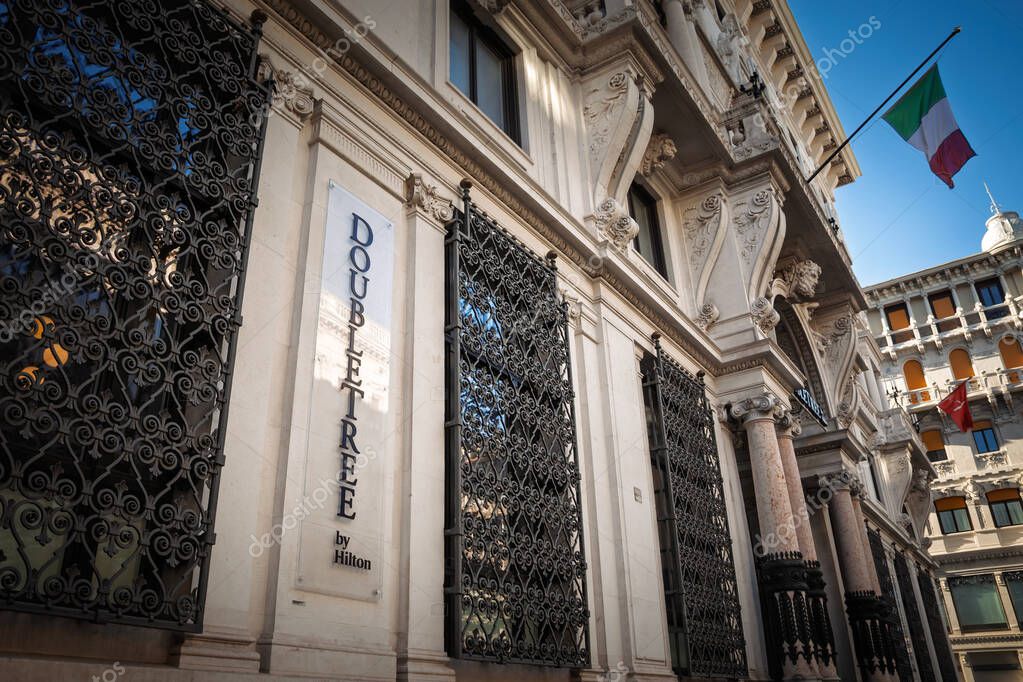 TRIESTE, ITALY - DECEMBER 17, 2024: Double Tree logo on the entrance their newly opened hotel of Trieste. Double Tree Hilton is a brand of luxury hotels owned by Hilton.
