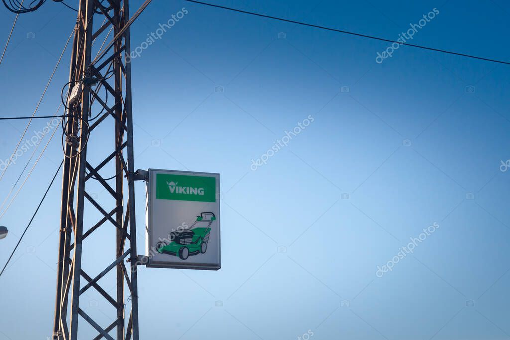 PANCEVO, SERBIA - APRIL 12, 1018: Viking lawnmower brand sign attached to a pole in Belgrade, Serbia; Viking was a brand of lawnmowers and garden tools, now part of Stihl.