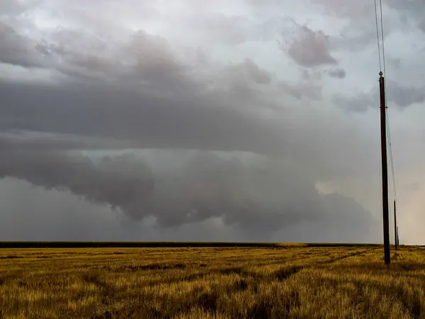 stock image A  tornado spins up from a quasi-linear convective system (QLCS) near Springfield, Colorado.