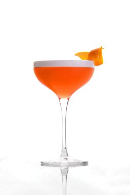 orange alcoholic drink in a cocktail glass, on a white background