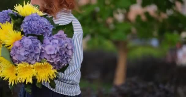 Women Walking Holding Bouquet Blue Hydrangea Background Green Garden Spring — Stock Video
