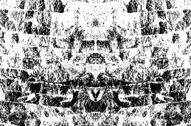 Kaba ve basit bir desen, inişli çıkışlı vuruşlarla yapılmış.