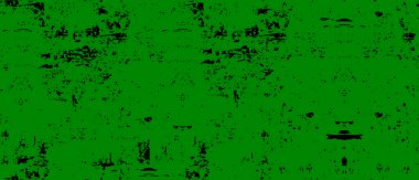 Üzerinde saat olan yeşil bir duvar.