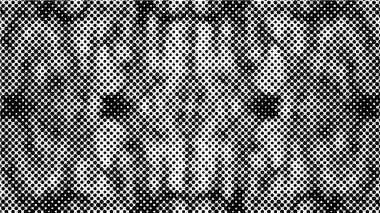 Arka plan siyah ve beyaz noktalı.