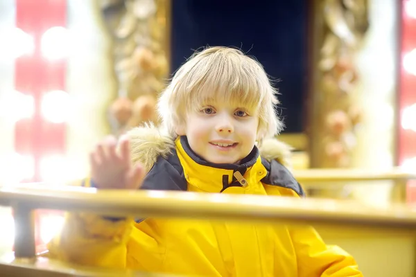 Cute Blonde Boy Enjoying Christmas Fair Little Child Riding Vintage — Stock Photo, Image