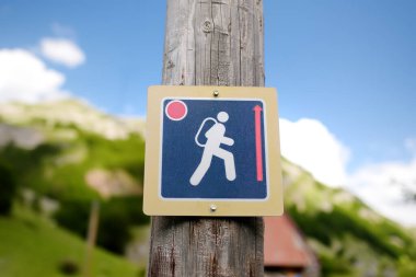 Sign of mountain hiking path of high complexity. Red trail designed for trained tourists. Track is not designed for easy walks. Special shoes are required. Backpacking and tracking concept.