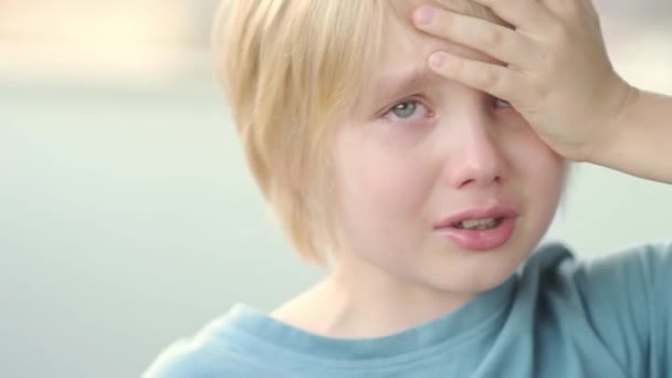 Close Portrait Crying School Age Child Cute Boy Blond Hair — Stock Video