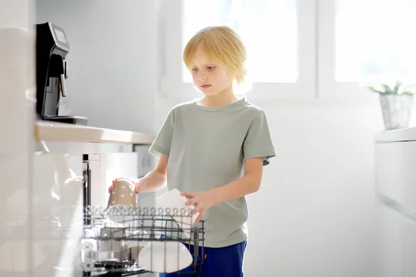 Preteen Boy Loading Dirty Dishes Dishwasher Child Does His Household — Stock Photo, Image