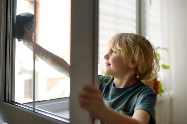Cute Little Boy Washing Window Home Child Helping Parents Household — Stok fotoğraf