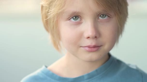Close Portrait Shy Confused School Age Child Cute Boy Looks — Stock Video