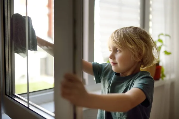 Cute Little Boy Washing Window Home Child Helping Parents Household — Stock Fotó