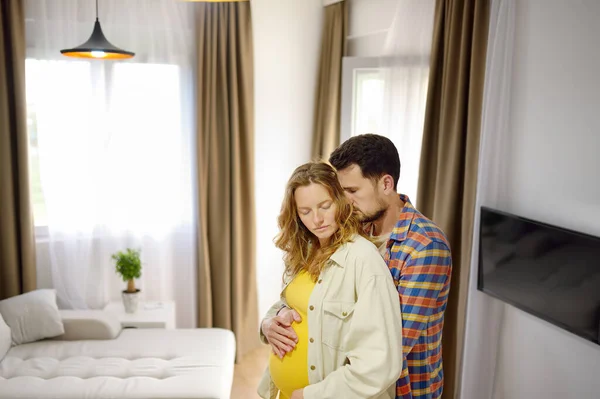 Happy Young Family Pregnant Couple Dancing Home Husband Embracing Wife — Stock Photo, Image
