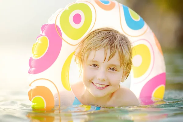 Little Boy Swimming Colorful Floating Ring Sea Sunny Summer Day — Foto Stock