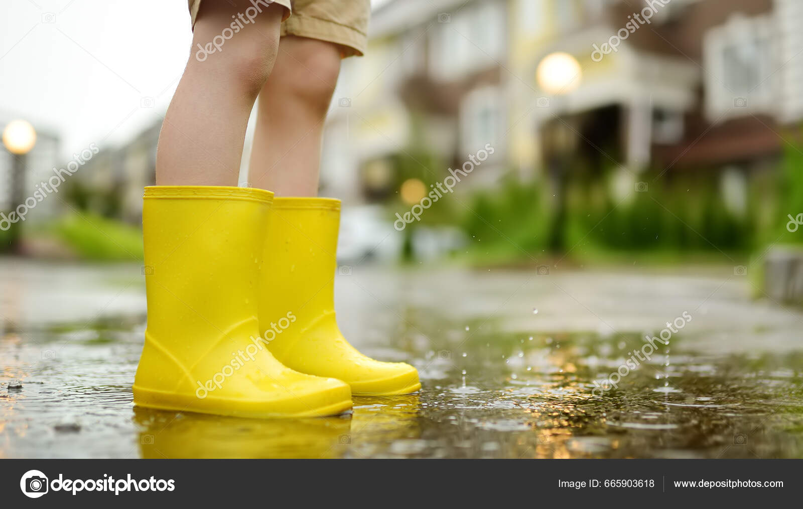 Little Boy Wearing Yellow Rubber Boots Walking Rainy Summer Day Stock Photo  by ©mary_smn 665903618