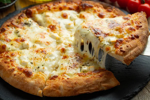 Slice Hot Italian Pizza Stretching Cheese Pizza Four Cheeses Basil Imágenes De Stock Sin Royalties Gratis