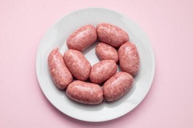 rolled botifarra, a pork meat sausage typical of Catalonia, Spain, in a white dish