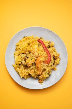 Classic dish of Spain, paella in white plate